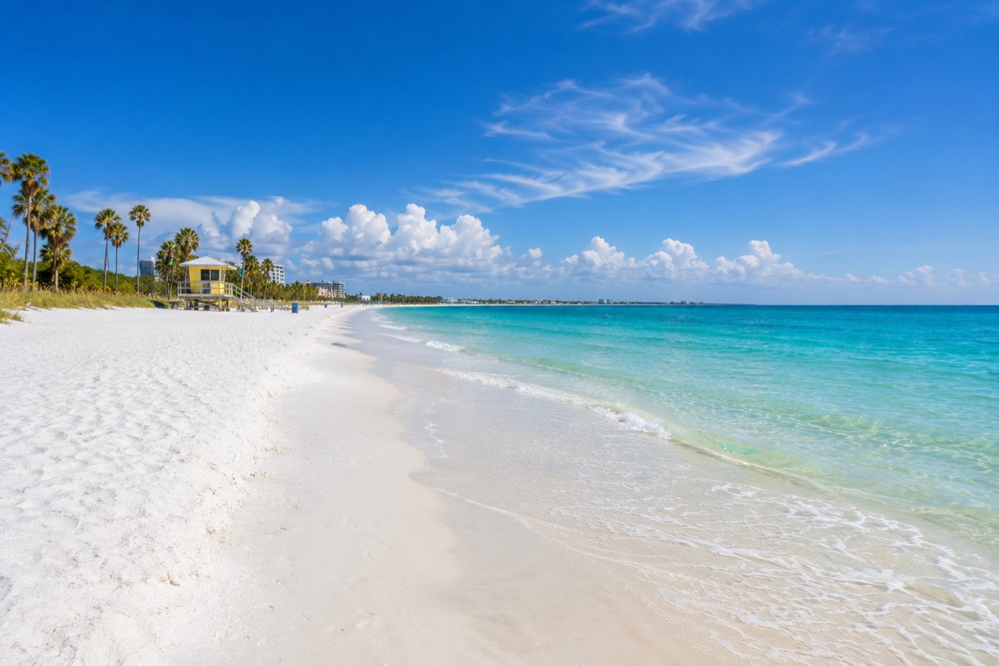 The white sand and clear Gulf water of Siesta Key Beach in Sarasota County